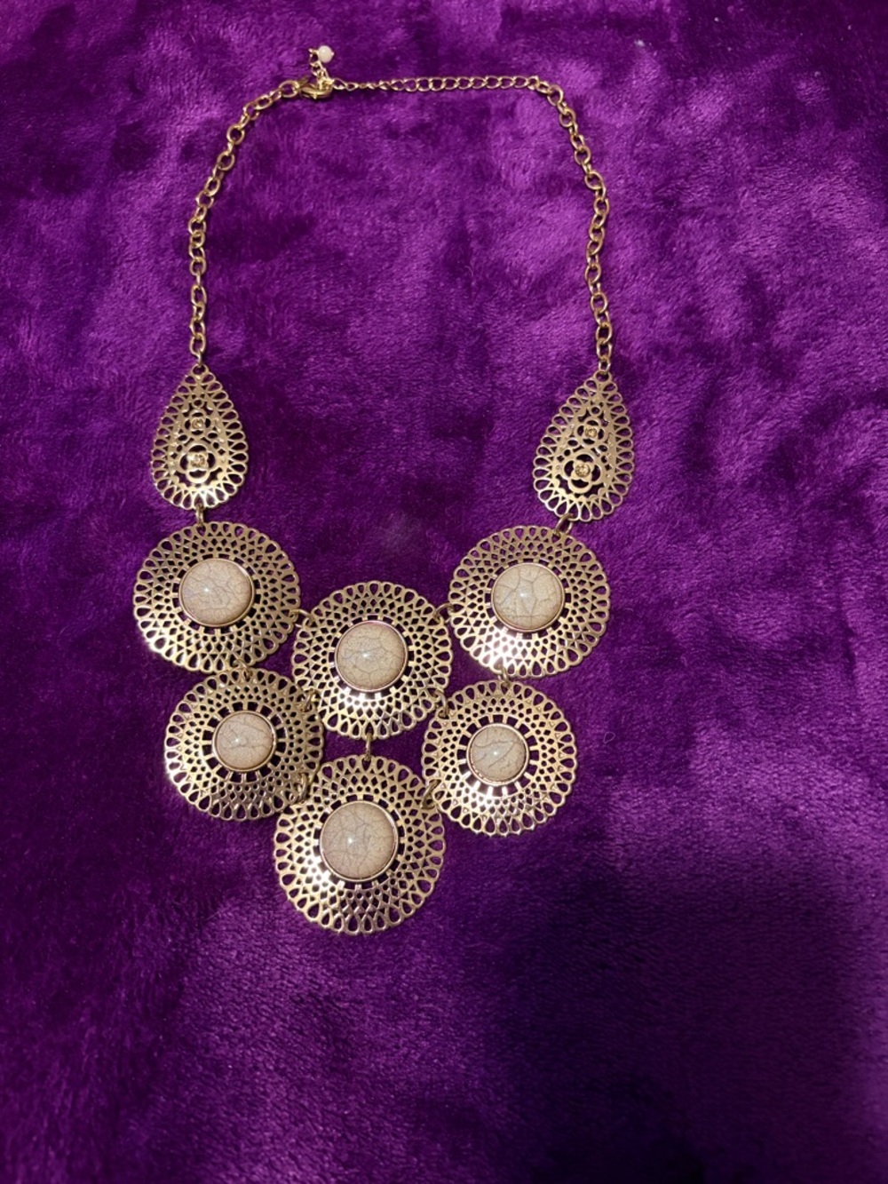 Gold Filigree Statement Necklace with Beige Stone Accents